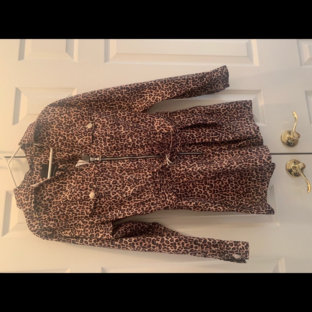 New. Never worn. Leopard Short jumpsuit.
